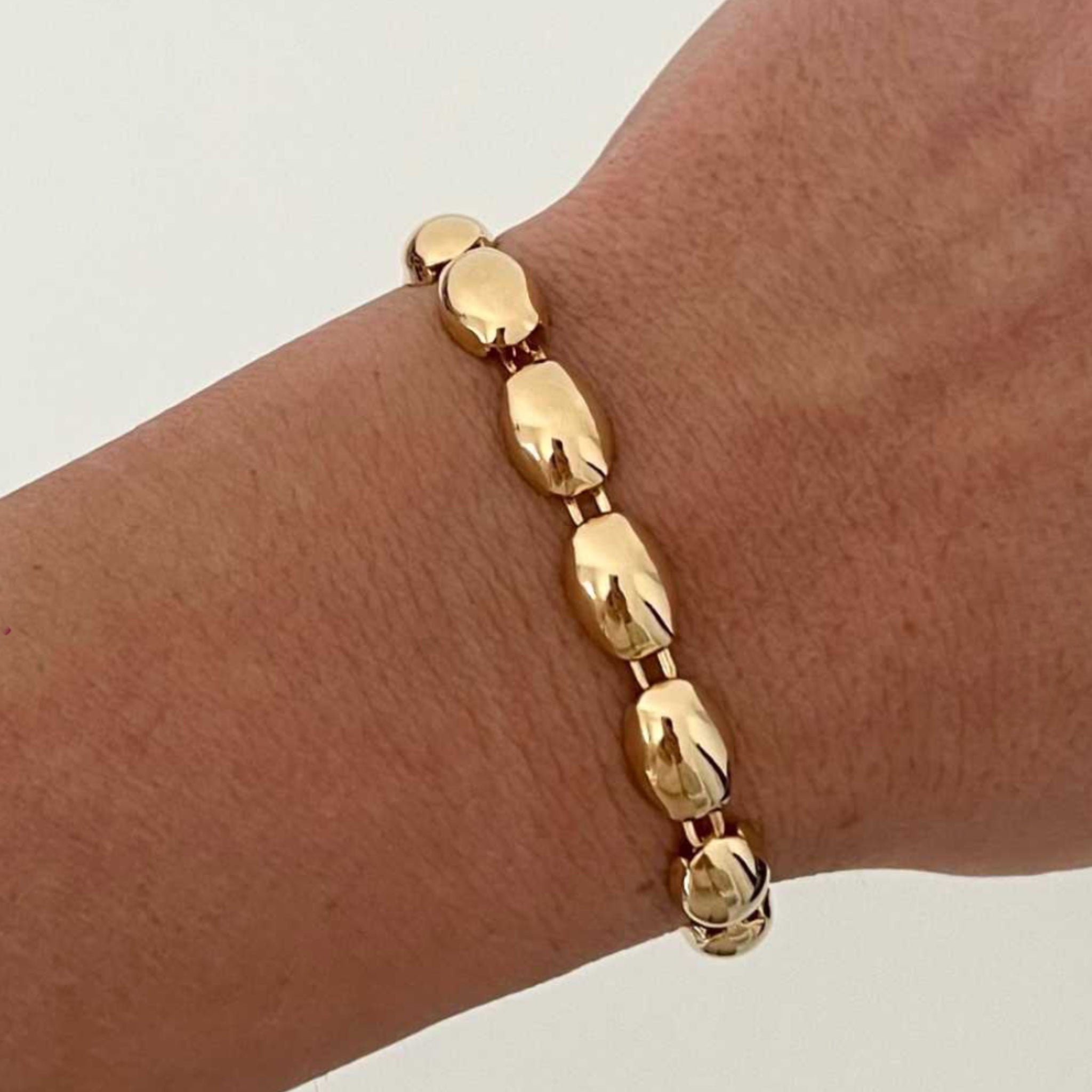 Pulsera Esferas Alargadas Oro - Piedra de Toque